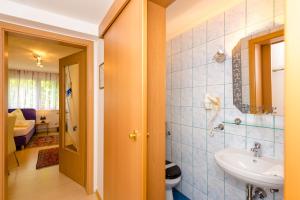 Koupelna v ubytování 1a Hotel Steiner