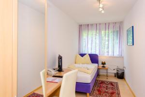 Postel nebo postele na pokoji v ubytování 1a Hotel Steiner
