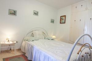 Postel nebo postele na pokoji v ubytování Maryvilla 46C + 5 fotografií