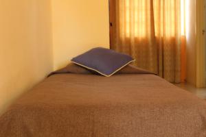 Postel nebo postele na pokoji v ubytování Hotel Ventura + 11 fotografií