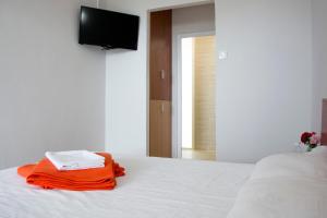 Postel nebo postele na pokoji v ubytování Vila Rasarit de Soare