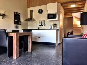Η κουζίνα ή μικρή κουζίνα στο Minicamping de Lindehoef +10 φωτογραφίες