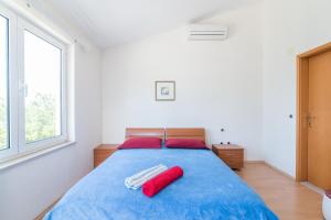 Postel nebo postele na pokoji v ubytování Studio Apartment Brela
