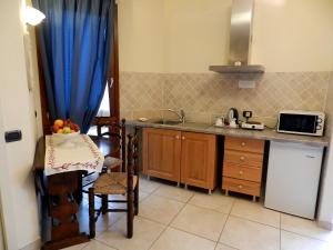 Kuchyň nebo kuchyňský kout v ubytování Hotel Ristorante Piccolo Chianti