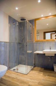Koupelna v ubytování Boutique Hotel Elvezia