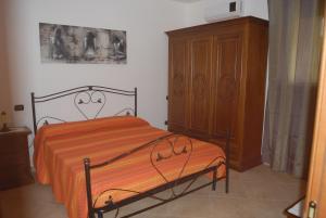 Postel nebo postele na pokoji v ubytování B&B Parcomonsignore