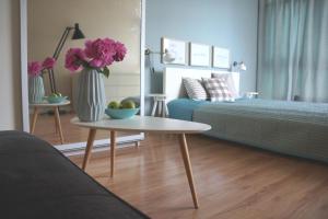 Posteľ alebo postele v izbe v ubytovaní APARTAMENT KOŁOBRZEG