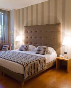 Postel nebo postele na pokoji v ubytování Hotel dei Duchi