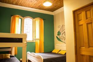 Postel nebo postele na pokoji v ubytování Hostal Forestal