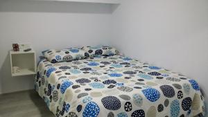 Postel nebo postele na pokoji v ubytování Loft Nerja Centro