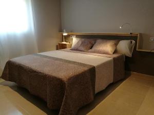 Cama o camas de una habitación en Apartaments Els Temporers