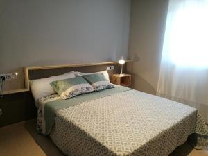 Cama o camas de una habitación en Apartaments Els Temporers