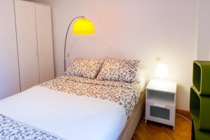 A bed or beds in a room at Segovia
