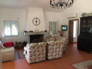 TV a/nebo společenská místnost v ubytování Holiday home Monte das Azinheiras