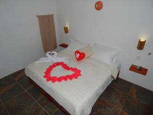 Postel nebo postele na pokoji v ubytování Entre Sombreros