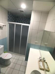 Koupelna v ubytování Chang Ti Metropolis Commercial Hotel + 31 fotografií