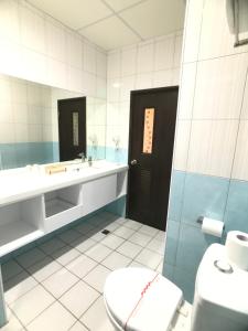 Koupelna v ubytování Chang Ti Metropolis Commercial Hotel