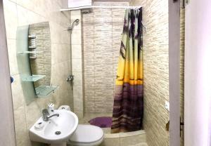 Koupelna v ubytování Akvitaniya Mini-Hotel + 37 fotografií
