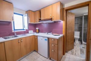 Köök või kööginurk majutusasutuses Val Di Compare Apartments