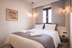 Postel nebo postele na pokoji v ubytování Central City Hotel