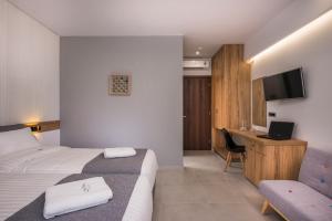 Postel nebo postele na pokoji v ubytování Central City Hotel
