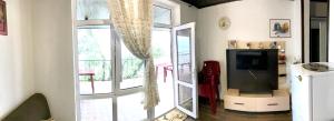 Kuchyň nebo kuchyňský kout v ubytování Akvitaniya Mini-Hotel