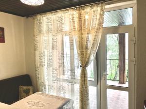 Postel nebo postele na pokoji v ubytování Akvitaniya Mini-Hotel