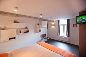 Säng eller sängar i ett rum på Drabstraat 2 Apartment