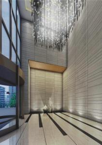 a rendering of a lobby with a chandelier at Suzhou Sun Plaza Hotel in Suzhou