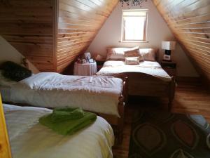 Postel nebo postele na pokoji v ubytování Assaroe House