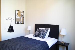 Postel nebo postele na pokoji v ubytování Hotel Falun