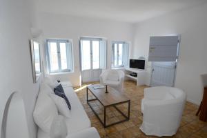 Prostor za sedenje u objektu Aria Suites & Villas