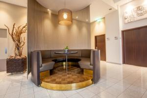 Ein Sitzbereich in der Unterkunft Hotel Artemis Amsterdam