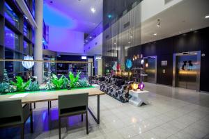 Das Fitnesscenter und/oder die Fitnesseinrichtungen in der Unterkunft Hotel Artemis Amsterdam