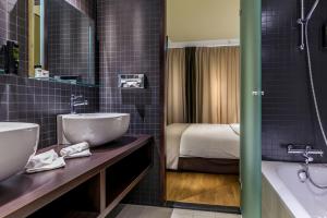 Ein Badezimmer in der Unterkunft Hotel Artemis Amsterdam