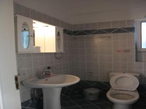Koupelna v ubytování Il Villaggio + 21 fotografií