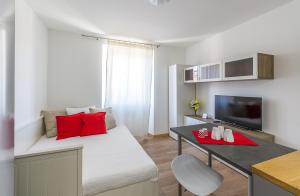 Televízia a/alebo spoločenská miestnosť v ubytovaní Alessia's Flat - Sarpi 2
