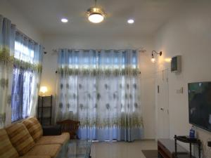 TV a/nebo společenská místnost v ubytování H2O Apartment + 13 fotografií