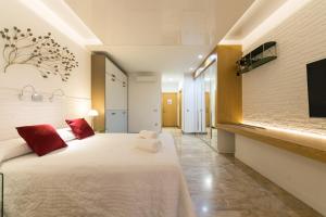 Postel nebo postele na pokoji v ubytování Suites Garden Loft Munch