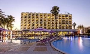 a hotel with a swimming pool and a resort at Royal Mirage Agadir in Agadir