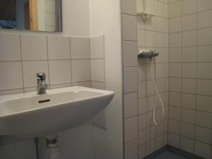 Koupelna v ubytování Snäckan + 7 fotografií