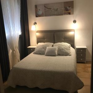 Postel nebo postele na pokoji v ubytování Chambre d'hôtes Costa Belle