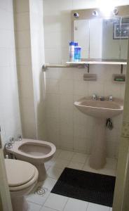 a bathroom with a toilet and a sink at Lo de Vega in San Salvador de Jujuy