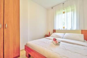 Postel nebo postele na pokoji v ubytování Apartments Vera