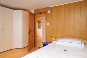 Postel nebo postele na pokoji v ubytování Chalet Felderhof