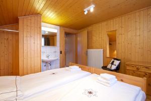 Postel nebo postele na pokoji v ubytování Chalet Felderhof