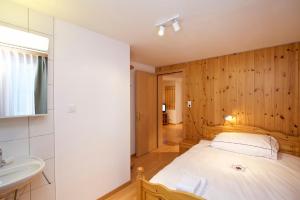 Postel nebo postele na pokoji v ubytování Chalet Felderhof