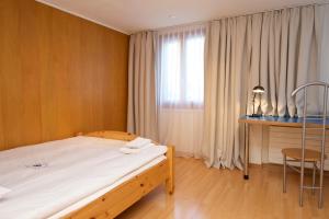 Postel nebo postele na pokoji v ubytování Chalet Felderhof