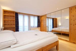 Postel nebo postele na pokoji v ubytování Chalet Felderhof