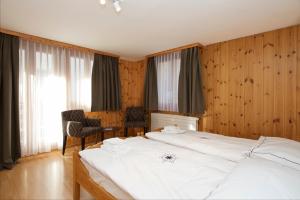 Postel nebo postele na pokoji v ubytování Chalet Felderhof